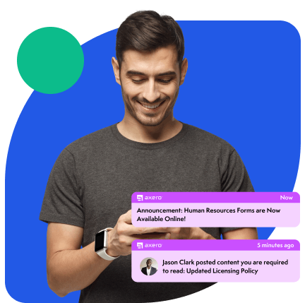 Smiling man in gray shirt looking at phone against blue background, with HR and licensing notifications.